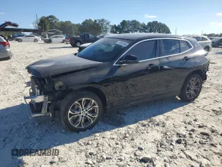 2021 BMW X2 sDrive28i with VIN WBXYH9C08M5S47984, listed as a Copart auction lot 74954164 with 70,829 mi miles and Salvage Title. Bid and sale history available at carsss.com. Image 1.