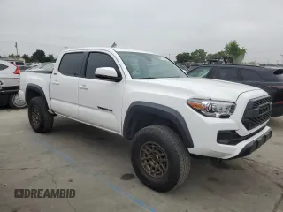 2023 Toyota Tacoma SR с VIN 3TYCZ5AN7PT114941, выставлен на аукционе Copart как лот 60172965 с пробегом 23 116 миль миль и Списание • Salvage title. История ставок и продаж доступна на DreamBid. Изображение 4.