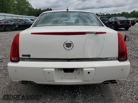 2006 Cadillac DTS 1SC z VIN 1G6KD57Y26U177384, wystawiony jako Copart lot #58200665 z przebiegiem 122 356 mil mil oraz Szkoda całkowita • Salvage title. Historia ofert i sprzedaży dostępna na DreamBid. Obrazek 6.