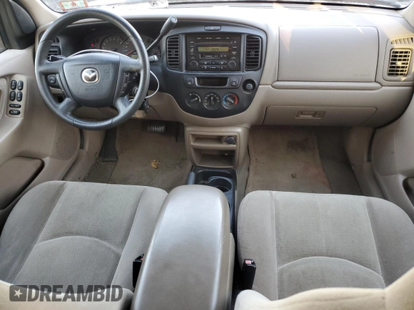 2001 Mazda Tribute LX with VIN 4F2CU08111KM19933, listed as a Copart auction lot 81174614 with 209,736 mi miles and Salvage Title. Bid and sale history available at DreamBid. Image 8.