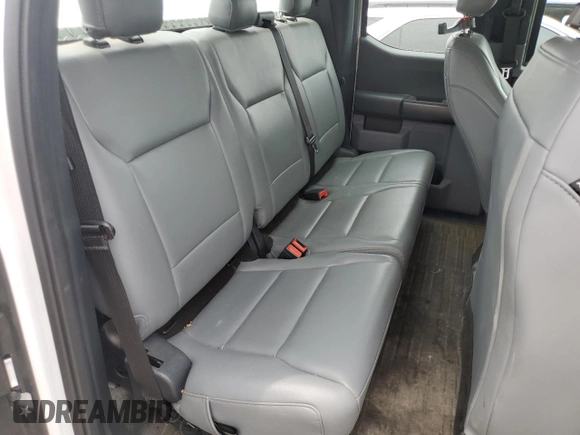 2021 Ford F-150 XL with VIN 1FTEX1CB8MKD88951, listed as a Copart auction lot 64674024 with 100,886 mi miles and Salvage title. Bid and sale history available at DreamBid. Image 10.