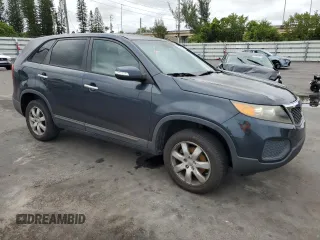 2012 Kia Sorento LX z VIN 5XYKT3A17CG274495, wystawiony jako Copart lot #56321925 z przebiegiem 130 439 mil mil oraz Szkoda całkowita • Salvage title. Historia ofert i sprzedaży dostępna na DreamBid. Obrazek 4.