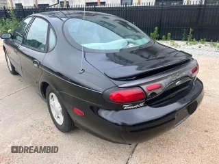 1999 Ford Taurus SE with VIN 1FAFP53SXXA145301, listed as a Copart auction lot 60351535 with 57,262 mi miles and Clean title. Bid and sale history available at DreamBid. Image 3.