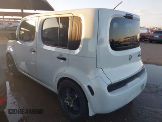 2009 Nissan Cube SL z VIN JN8AZ28R99T102860, wystawiony jako IAAI lot #42441475 z przebiegiem 151 466 mil mil oraz . Historia ofert i sprzedaży dostępna na DreamBid. Obrazek 3.