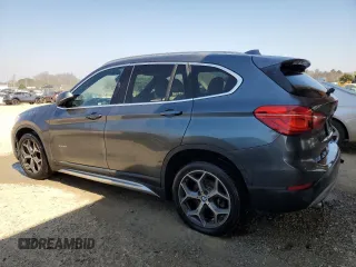 2016 BMW X1 xDrive28i with VIN WBXHT3C35G5E52949, listed as a Copart auction lot 48480215 with 100,228 mi miles and Clean Title. Bid and sale history available at carsss.com. Image 2.
