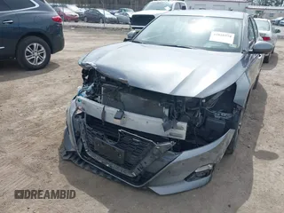 2019 Nissan Altima 2.5 Platinum with VIN 1N4BL4FV1KC104563, listed as a IAAI auction lot 41828774 with 44,006 mi miles. Bid and sale history available at carsss.com. Image 6.