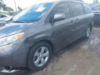 2011 Toyota Sienna LE AAS with VIN 5TDKK3DC4BS044382, listed as a IAAI auction lot 39280364 with 104,262 mi miles. Bid and sale history available at carsss.com. Image 6.