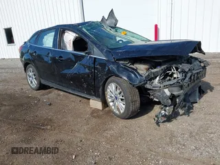 2016 Ford Focus Titanium with VIN 1FADP3J22GL242818, listed as a IAAI auction lot 42177015 with Not provided miles and . Bid and sale history available at DreamBid. Image 1.