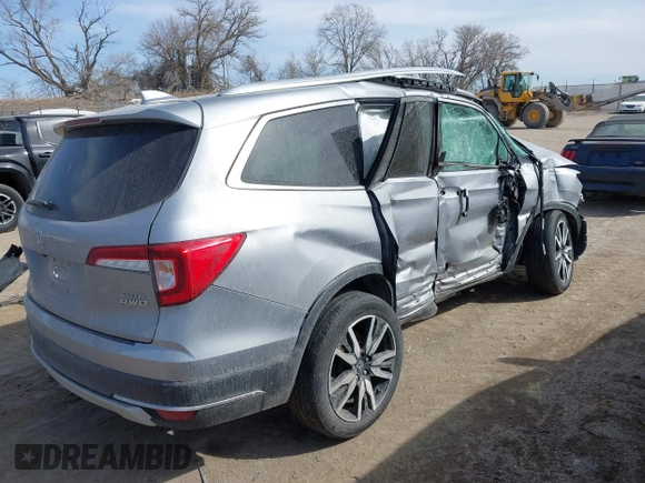 2021 Honda Pilot Elite with VIN 5FNYF6H00MB085678, listed as a IAAI auction lot 41783075 with Not Provided miles and . Bid and sale history available at DreamBid. Image 4.