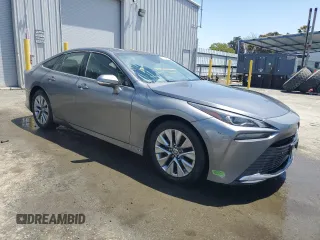2022 Toyota Mirai XLE with VIN JTDAAAAA6NA007342, listed as a Copart auction lot 60264625 with 27,410 mi miles and Salvage title. Bid and sale history available at DreamBid. Image 4.