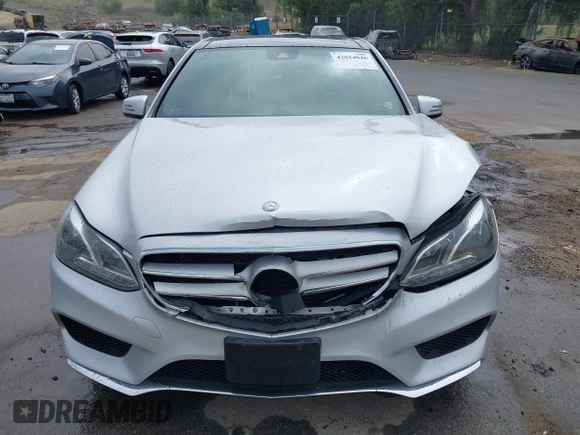 2014 Mercedes-Benz E E 350 Sport with VIN WDDHF5KB8EB009303, listed as a IAAI auction lot 42014846 with 97,214 mi miles. Bid and sale history available at carsss.com. Image 12.