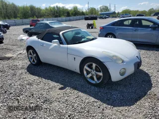 2008 Pontiac Solstice z VIN 1G2MC35B58Y123587, wystawiony jako Copart lot #52017005 z przebiegiem Nie podano mil oraz Szkoda całkowita • Salvage title. Historia ofert i sprzedaży dostępna na DreamBid. Obrazek 4.