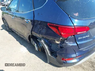 2018 Hyundai Santa Fe Ultimate with VIN 5XYZWDLA3JG571432, listed as a IAAI auction lot 42395245 with 69,330 mi miles and . Bid and sale history available at DreamBid. Image 6.