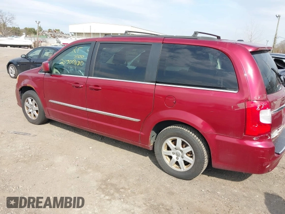 2012 Chrysler Town & Country Touring with VIN 2C4RC1BG5CR400323, listed as a IAAI auction lot 41902471 with 999,999 mi miles. Bid and sale history available at carsss.com. Image 3.