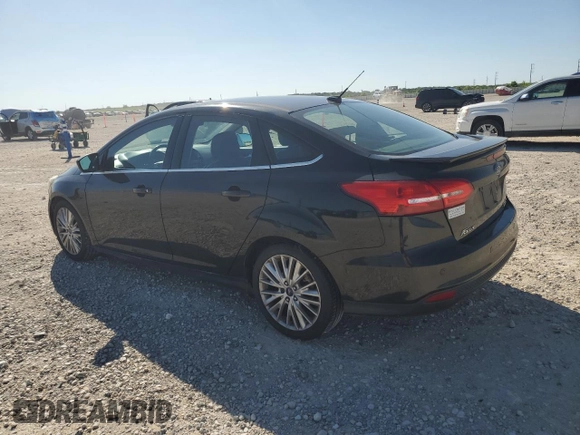 2015 Ford Focus Titanium with VIN 1FADP3J24FL305710, listed as a Copart auction lot 52413155 with 181,571 mi miles and Clean Title. Bid and sale history available at carsss.com. Image 2.