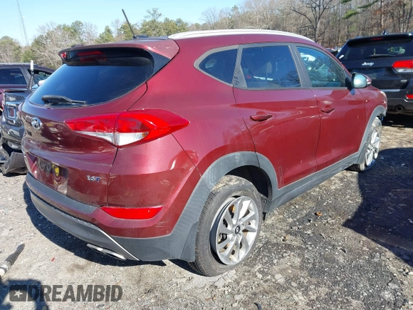 2016 Hyundai Tucson Sport with VIN KM8J33A22GU194476, listed as a IAAI auction lot 41201514 with 41,601 mi miles. Bid and sale history available at carsss.com. Image 4.