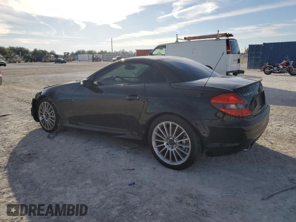 2006 Mercedes-Benz SLK-Class 5.5L AMG with VIN WDBWK73F06F100763, listed as a Copart auction lot 86308114 with 147,759 mi miles and Salvage Title. Bid and sale history available at carsss.com. Image 2.
