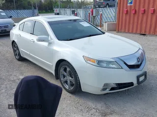 2010 Acura TL Technology z VIN 19UUA9F55AA008999, wystawiony jako IAAI lot #42138275 z przebiegiem 156 460 mil mil oraz . Historia ofert i sprzedaży dostępna na DreamBid. Obrazek 1.