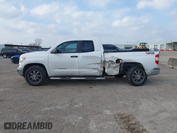 2016 Toyota Tundra SR z VIN 5TFRM5F10GX097792, wystawiony jako IAAI lot #41516069 z przebiegiem 199 598 mil mil oraz . Historia ofert i sprzedaży dostępna na DreamBid. Obrazek 14.