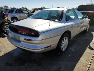 1999 Oldsmobile Aurora with VIN 1G3GR62C7X4109461, listed as a Copart auction lot 75916764 with 107,690 mi miles and Salvage Title. Bid and sale history available at DreamBid. Image 3.