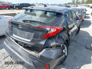 2021 Toyota C-HR LE with VIN NMTKHMBX3MR128835, listed as a IAAI auction lot 41891619 with 57,744 mi miles and . Bid and sale history available at DreamBid. Image 4.