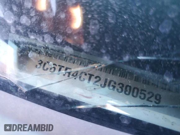 2018 Ram 2500 Tradesman with VIN 3C6TR4CT2JG300529, listed as a Copart auction lot 87902645 with Not provided miles and Salvage title. Bid and sale history available at DreamBid. Image 12.