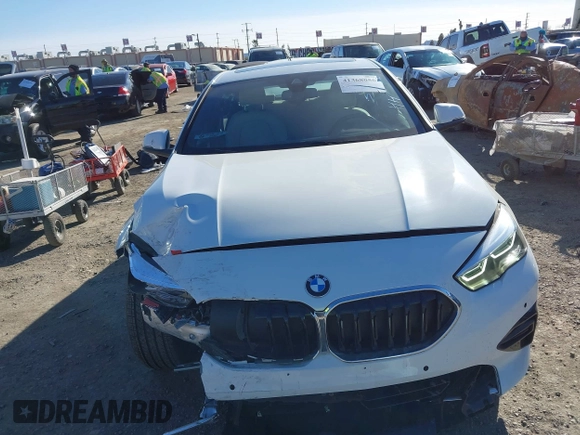 2023 BMW 2 Series 228i with VIN WBA53AK09P7M14294, listed as a IAAI auction lot 41368056 with 9,601 mi miles. Bid and sale history available at carsss.com. Image 12.