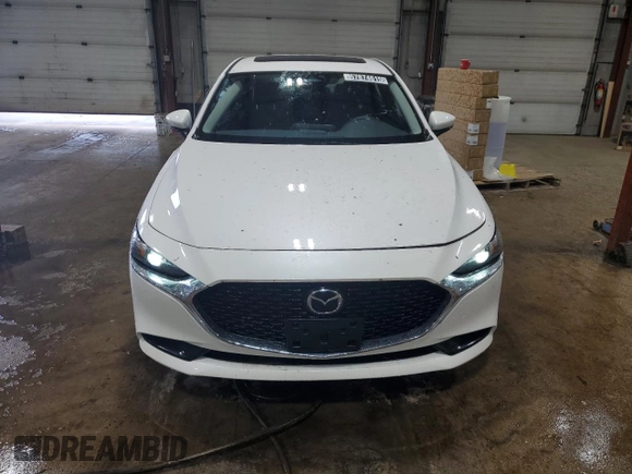 2025 Mazda 3 S Preferred z VIN JM1BPACM8S1775538, wystawiony jako Copart lot #57874615 z przebiegiem 851 mil mil oraz Czysty tytuł • Clean title. Historia ofert i sprzedaży dostępna na DreamBid. Obrazek 5.