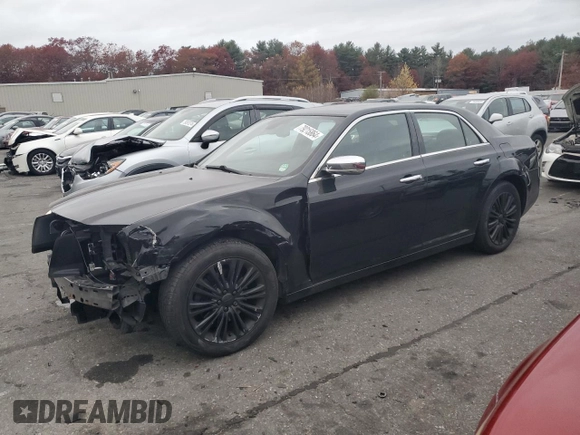 2012 Chrysler 300 C with VIN 2C3CCAKT9CH202809, listed as a Copart auction lot 79215864 with 121,610 mi miles and Salvage Title. Bid and sale history available at DreamBid. Image 1.