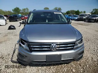 2021 Volkswagen Tiguan S with VIN 3VV1B7AX7MM133023, listed as a Copart auction lot 55229545 with 57,228 mi miles and Salvage title. Bid and sale history available at DreamBid. Image 5.
