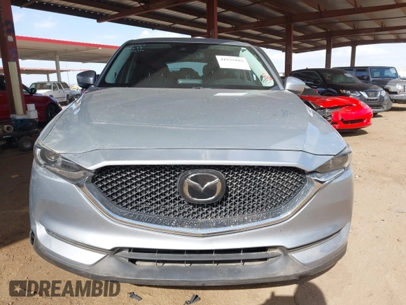 2017 Mazda CX-5 Grand Touring with VIN JM3KFADL3H0121772, listed as a IAAI auction lot 41935183 with 48,869 mi miles and . Bid and sale history available at carsss.com. Image 12.