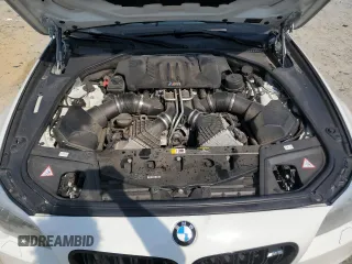 2014 BMW M5 with VIN WBSFV9C54ED097879, listed as a Copart auction lot 61380464 with 78,367 mi miles and Salvage Title. Bid and sale history available at carsss.com. Image 11.