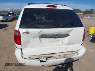 2003 Chrysler Town & Country LX with VIN 2C4GP44L33R117314, listed as a IAAI auction lot 41674437 with Not Provided miles and . Bid and sale history available at DreamBid. Image 6.