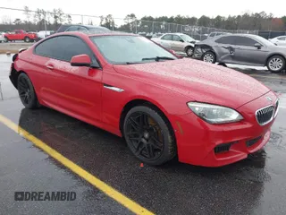 2013 BMW 6 Series 650i with VIN WBAYM9C53DDW20243, listed as a IAAI auction lot 41762838 with 100,905 mi miles and . Bid and sale history available at carsss.com. Image 1.