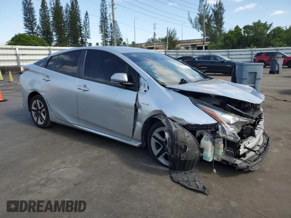 2017 Toyota Prius Two z VIN JTDKARFU0H3036043, wystawiony jako Copart lot #57936795 z przebiegiem 142 025 mil mil oraz Szkoda całkowita • Salvage title. Historia ofert i sprzedaży dostępna na DreamBid. Obrazek 4.