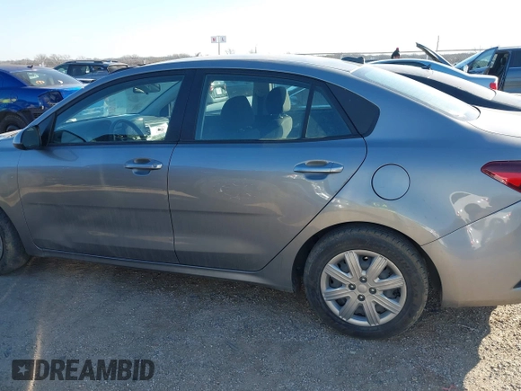 2021 Kia Rio LX with VIN 3KPA24AD8ME377938, listed as a IAAI auction lot 41465632 with 62,964 mi miles. Bid and sale history available at carsss.com. Image 14.