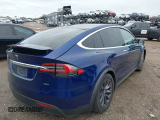 2018 Tesla Model X 75D with VIN 5YJXCAE2XJF111180, listed as a IAAI auction lot 41988079 with 114,593 mi miles and . Bid and sale history available at DreamBid. Image 4.