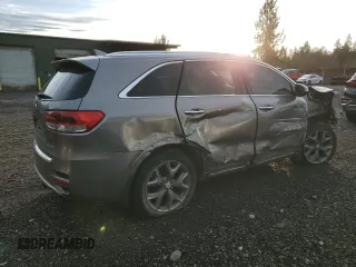 2016 Kia Sorento SXL z VIN 5XYPKDA16GG001293, wystawiony jako Copart lot #85128944 z przebiegiem 121 180 mil mil oraz Szkoda całkowita • Salvage title. Historia ofert i sprzedaży dostępna na DreamBid. Obrazek 3.