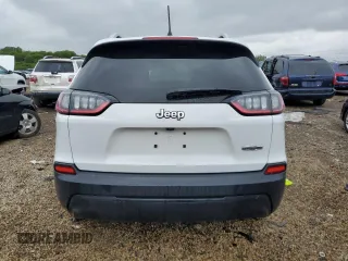 2019 Jeep Cherokee Latitude z VIN 1C4PJLCB3KD269759, wystawiony jako Copart lot #57451945 z przebiegiem 80 263 mil mil oraz Szkoda całkowita • Salvage title. Historia ofert i sprzedaży dostępna na DreamBid. Obrazek 6.