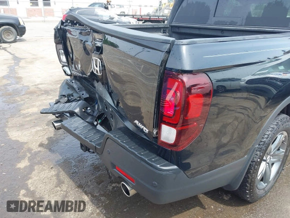 2023 Honda Ridgeline RTL-E with VIN 5FPYK3F76PB042100, listed as a IAAI auction lot 42274861 with 16,822 mi miles and . Bid and sale history available at DreamBid. Image 17.