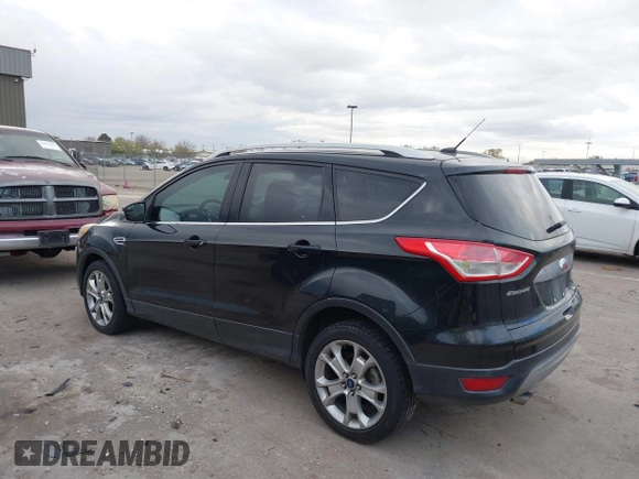 2015 Ford Escape Titanium with VIN 1FMCU9J96FUA27221, listed as a IAAI auction lot 41925276 with 180,758 mi miles and . Bid and sale history available at carsss.com. Image 3.