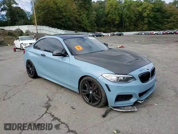 2016 BMW 2 Series M235i xDrive with VIN WBA1J9C53GV696649, listed as a Copart auction lot 71152243 with 0 mi miles. Bid and sale history available at carsss.com. Image 11.