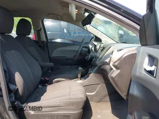 2014 Chevrolet Sonic LT with VIN 1G1JC5SH8E4168554, listed as a IAAI auction lot 42129823 with 276,709 mi miles and . Bid and sale history available at DreamBid. Image 5.