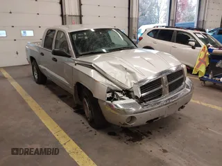 2005 Dodge Dakota Laramie with VIN 1D7HW58N75S188127, listed as a IAAI auction lot 41209206 with 117,480 mi miles and . Bid and sale history available at DreamBid. Image 1.