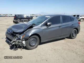 2020 Subaru Impreza with VIN 4S3GTAA62L1733731, listed as a Copart auction lot 56933785 with 74,424 mi miles and Salvage title. Bid and sale history available at DreamBid. Image 1.