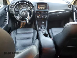 2016 Mazda CX-5 Grand Touring with VIN JM3KE4DY3G0713283, listed as a Copart auction lot 73346194 with 135,382 mi miles and Salvage Title. Bid and sale history available at carsss.com. Image 8.