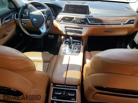 2017 BMW 7 Series 740i z VIN WBA7E2C30HG741105, wystawiony jako Copart lot #56632005 z przebiegiem 95 162 mil mil oraz Czysty tytuł • Clean title. Historia ofert i sprzedaży dostępna na DreamBid. Obrazek 8.