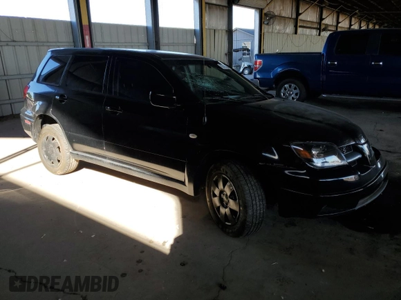 2003 Mitsubishi Outlander LS with VIN JA4LX31G43U021849, listed as a Copart auction lot 76746454 with 136,939 mi miles and Salvage Title. Bid and sale history available at carsss.com. Image 4.