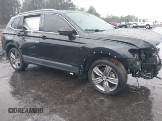 2021 Volkswagen Tiguan SE with VIN 3VV3B7AX3MM058751, listed as a IAAI auction lot 41527365 with 19,646 mi miles and . Bid and sale history available at DreamBid. Image 1.