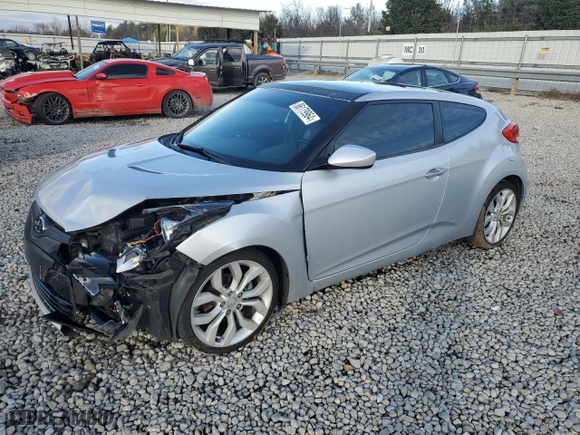 2012 Hyundai Veloster w/Black Int with VIN KMHTC6AD7CU060293, listed as a Copart auction lot 86179964 with 117,019 mi miles and Salvage Title. Bid and sale history available at carsss.com. Image 1.